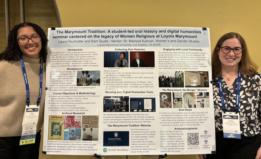 Two students flanking research poster